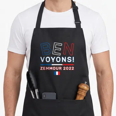 Tablier de cuisine noir avec linscription Ben Voyons Zemmour 2022 et drapeau français stylisé au centre.