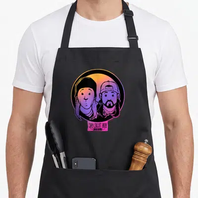 Tablier de cuisine noir avec portrait coloré de Jay et Silent Bob Reboot en style cartoon.