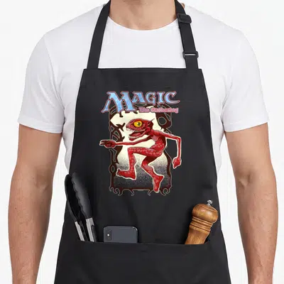 Tablier de cuisine noir avec illustration d'un monstre rouge Magic The Gathering Tempest Monster Deck