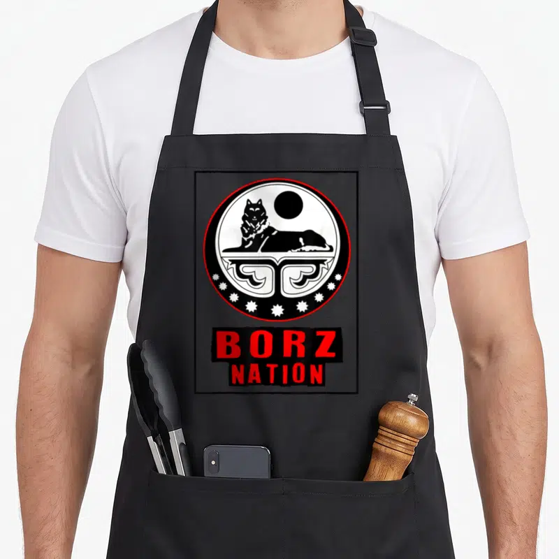Tablier de cuisine noir avec logo circulaire Borz Nation, chien noir et texte rouge BORZ NATION en bas.