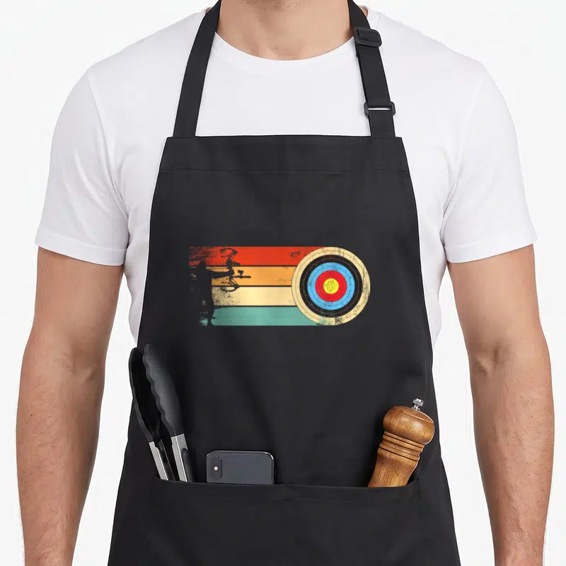 Tablier de cuisine noir avec silhouette d'archer et cible colorée sur bandes rétro
