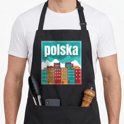 Tablier de cuisine noir avec illustration de bâtiments colorés et le mot « Polska » en blanc sur fond turquoise.