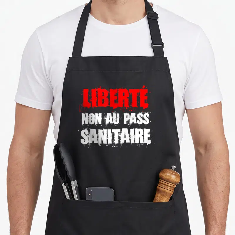 Tablier de cuisine noir avec inscription Liberty non au pass sanitaire en rouge et blanc.