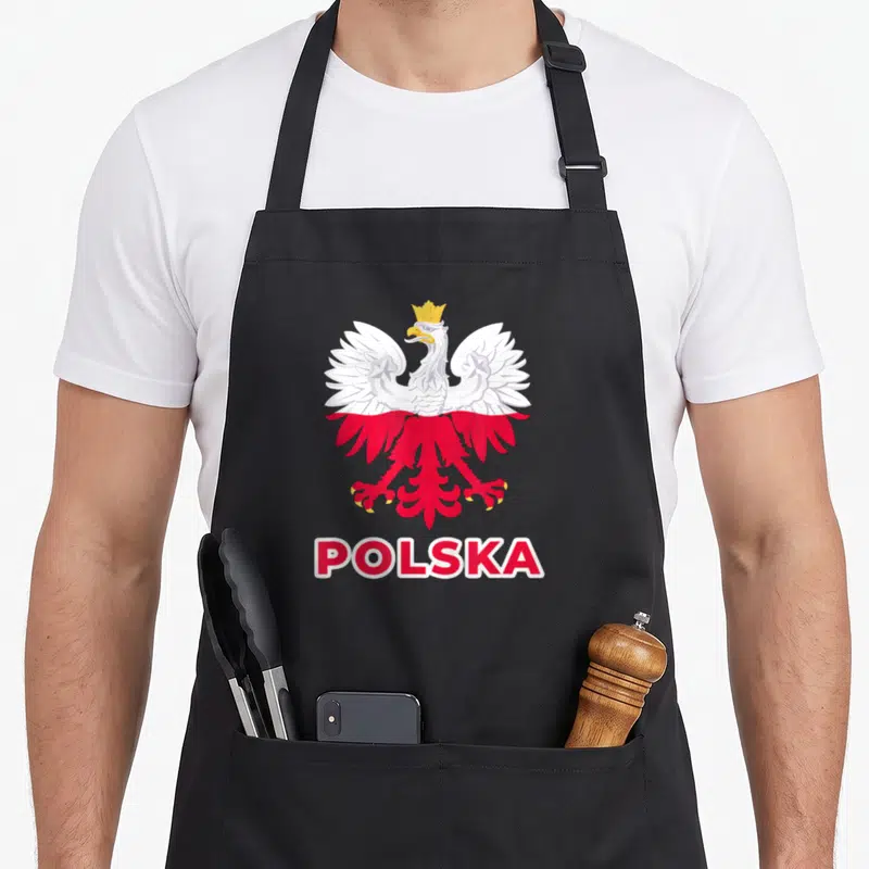 Tablier de cuisine noir avec aigle blanc couronné et inscription POLSKA en rouge et blanc.