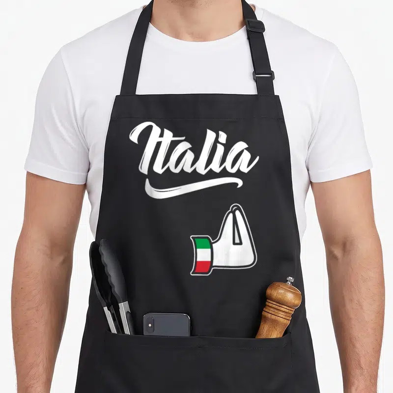 Tablier de cuisine noir avec inscription Italia et illustration de main au poignet tricolore italien