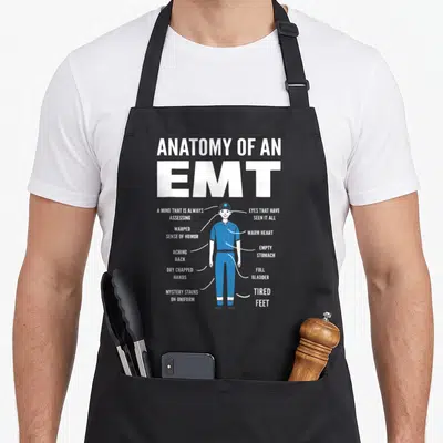 Tablier de cuisine noir avec illustration anatomique d'un EMT et textes explicatifs en anglais blanc.