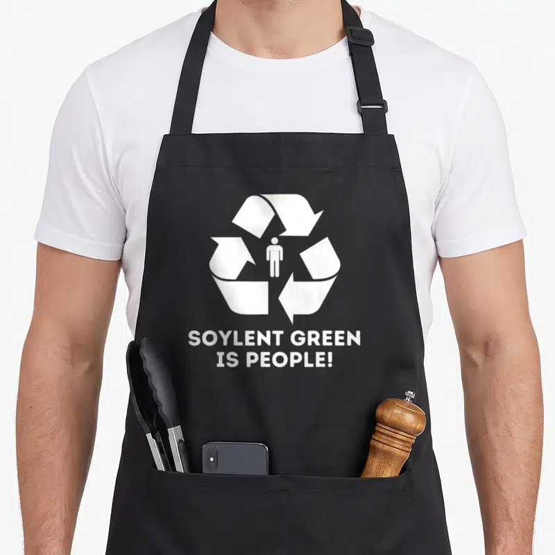 Tablier de cuisine noir avec logo recyclage blanc et silhouette humaine centrale sur fond uni.