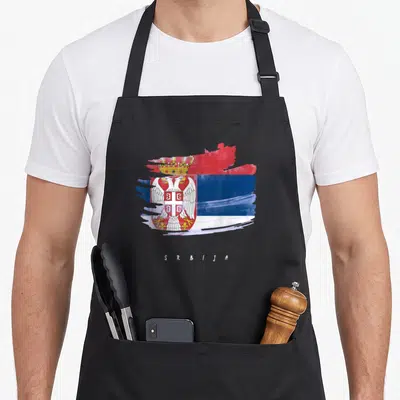 Tablier de cuisine noir avec aigle bicéphale, drapeau tricolore et inscription Srbija en bas.