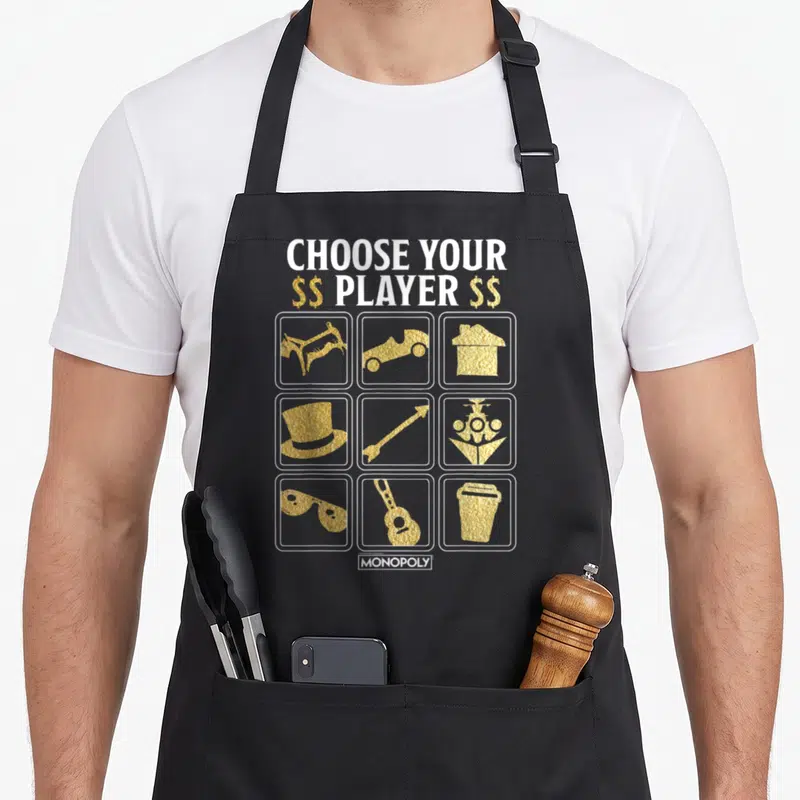 Tablier de cuisine noir avec neuf pions dorés et le texte Choose Your Player Icons en blanc.