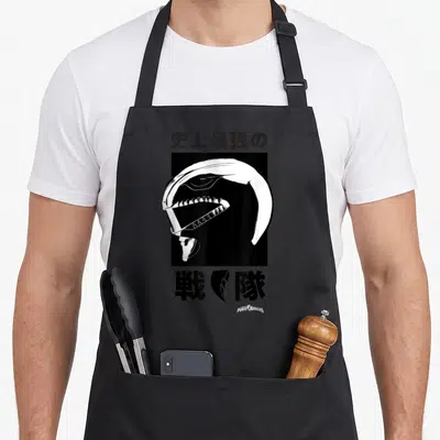 Tablier de cuisine noir avec illustration blanche profil casque Power Rangers et caractères kanjis japonais.