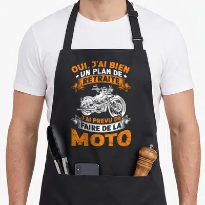 Tablier de cuisine noir avec inscription orange et blanche sur plan de retraite moto et illustration de cycle vintage