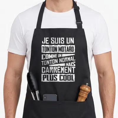 Tablier de cuisine noir avec inscription blanche Je suis un tonton motard plus cool style graffiti.