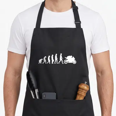 Tablier de cuisine noir avec silhouette blanche montrant l'évolution humaine vers un motard sur sportive.