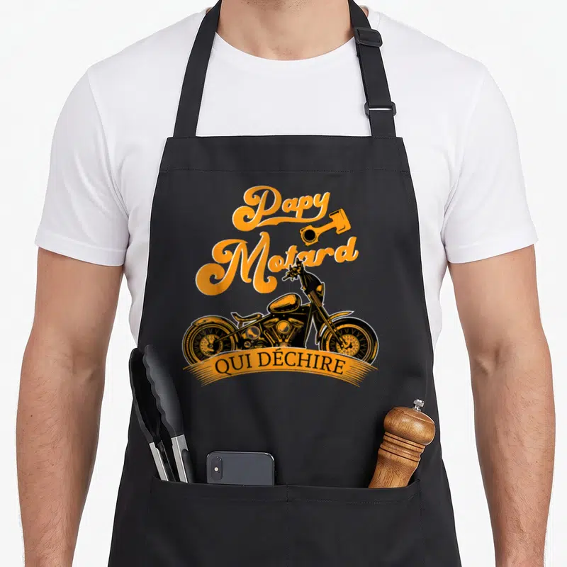 Tablier de cuisine noir avec illustration Papy Motard Qui Déchire et moto custom orange.