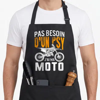 Tablier de cuisine noir avec illustration de moto et texte Pas besoin d'un psy j'ai ma moto en orange et blanc.