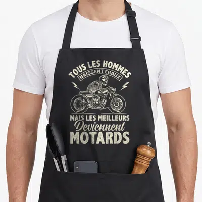 Tablier de cuisine noir avec illustration squelette en selle moto et texte Tous les hommes naissent égaux mais les meilleurs deviennent motards