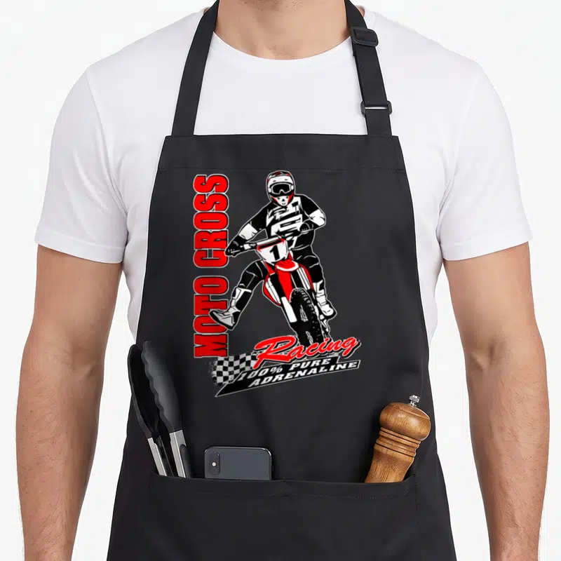 Tablier de cuisine noir avec illustration d'un pilote de motocross et l'inscription Moto Cross Racing 100% Pure Adrenaline.