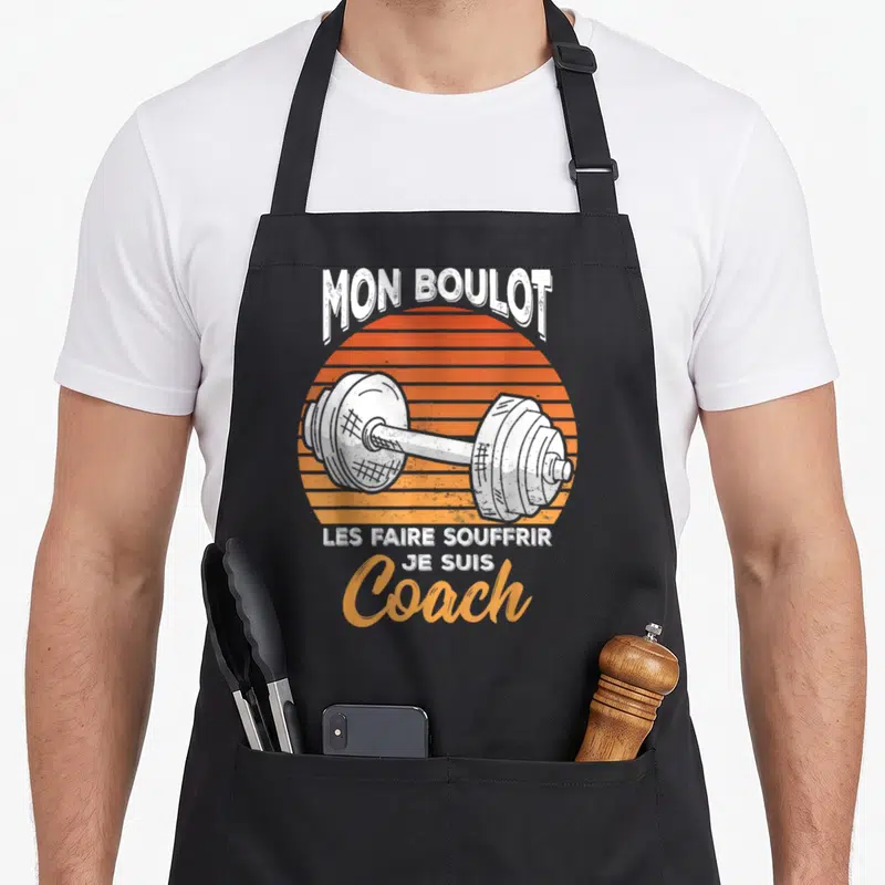 Tablier de cuisine noir avec illustration de barbell orange et texte Mon Boulot C'est Coach Je Suis Les Faire Souffrir