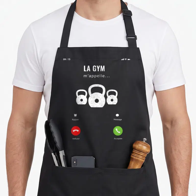 Tablier de cuisine noir avec illustration d'un écran de téléphone affichant trois kettlebells et les options Refuser ou Accepter un appel.
