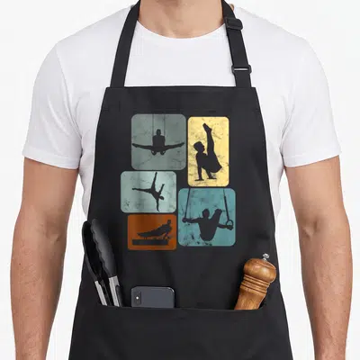 Tablier de cuisine noir avec cinq rectangles colorés affichant des silhouettes de gymnastique acrobatique et de sport en gris foncé sur fond texturé.