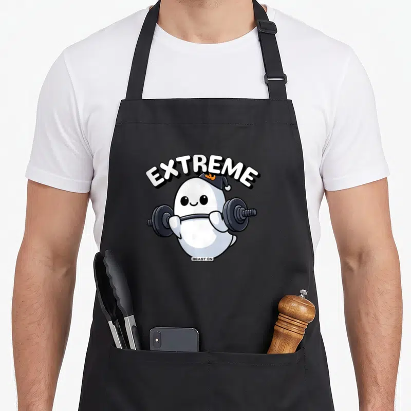 Tablier de cuisine noir avec un fantôme blanc soulevant une barre de poids et le mot EXTREME.