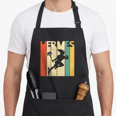 Tablier de cuisine noir avec silhouette grise d'Hermès courant et texte HERMÈS multicolore sur bandes verticales.