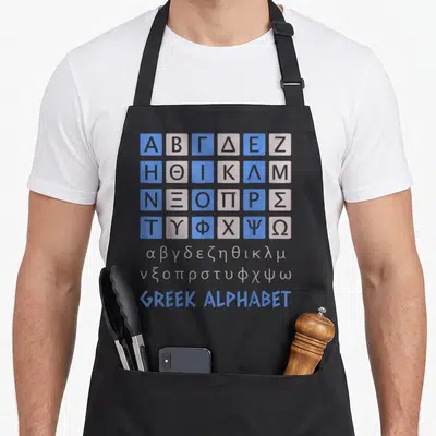 Tablier de cuisine noir avec l'alphabet grec en carreaux bleus et gris et le texte GREEK ALPHABET en bas.
