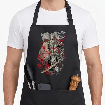 Tablier de cuisine noir avec illustration d'un knight templier tenant une épée et un bouclier à la croix rouge.