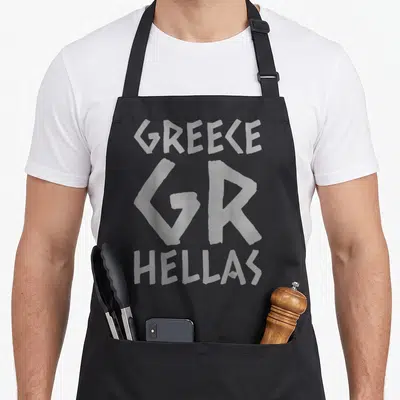 Tablier de cuisine noir avec inscription Greece GR Hellas en lettres capitales grises au style graphique.