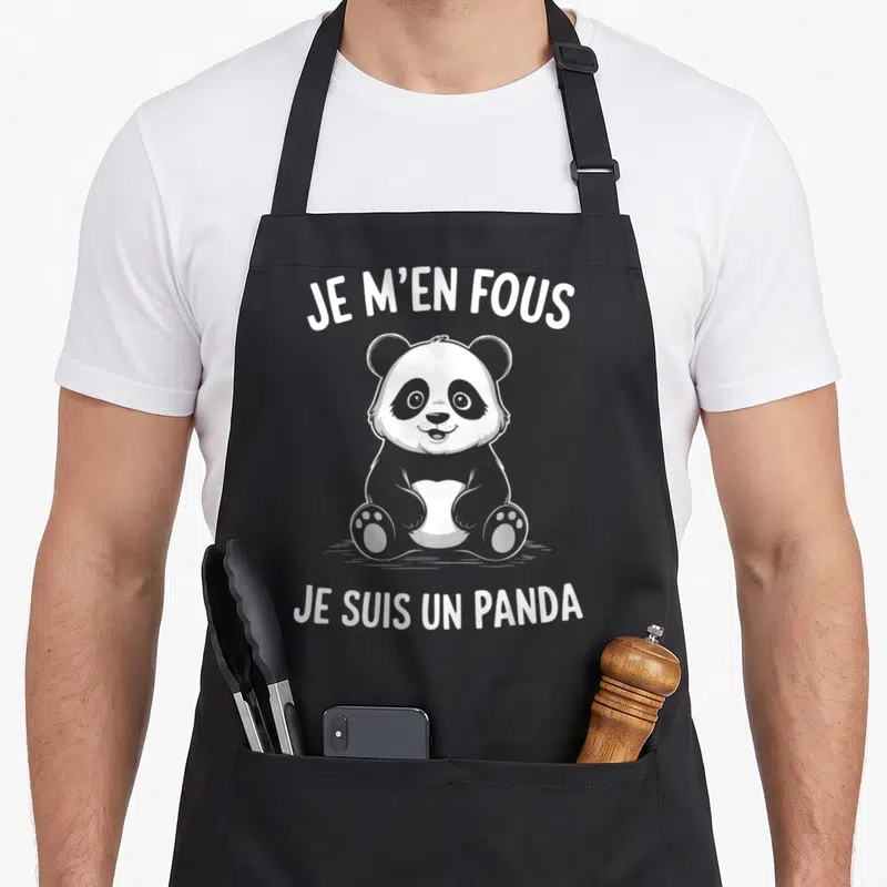 Tablier de cuisine noir avec un panda dessiné en blanc et le texte Je m'en fous je suis un panda.