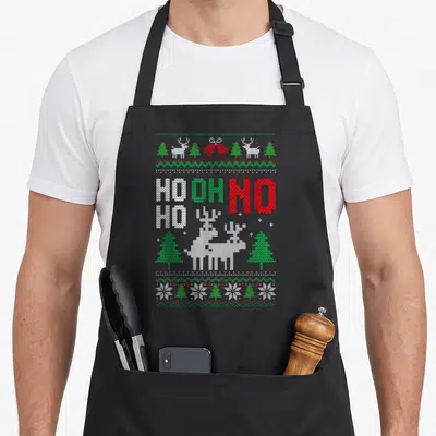 Tablier de cuisine noir avec motif imitant un pull de Noël aux rennes et texte Ho Ho Oh No.