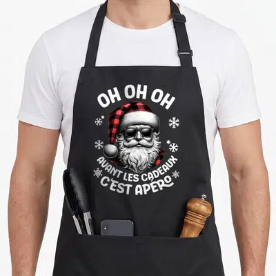 Tablier de cuisine noir avec Père Noel lunettes de soleil et texte Oh oh oh avant les cadeaux c'est apéro