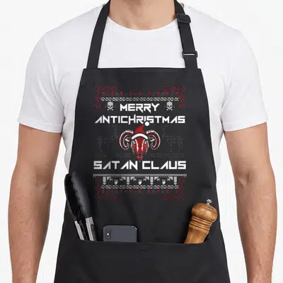 Tablier de cuisine noir avec motif pixel art bouc de Baphomet portant un bonnet de Noël rouge et des inscriptions blanches.