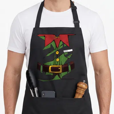 Tablier de cuisine noir avec illustration d'un costume de lutin vert à col rouge et ceinture marron à boucle dorée.