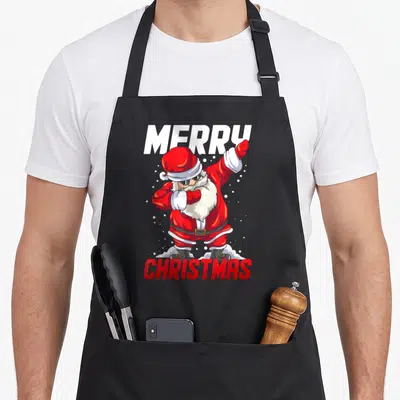 Tablier de cuisine noir avec un Père Noël en train de faire le dab portant des lunettes de soleil.