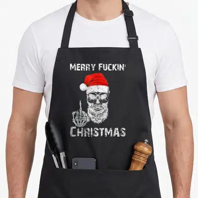Tablier de cuisine noir avec un crâne barbu en bonnet de Père Noël et main squelettique.