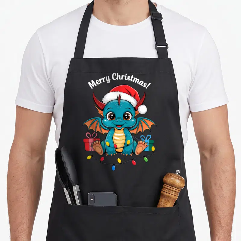 Tablier de cuisine noir avec dragon bleu en bonnet de Père Noël et guirlandes lumineuses colorées