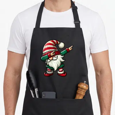 Tablier de cuisine noir avec illustration colorée d'un nain effectuant une pose dab festive.
