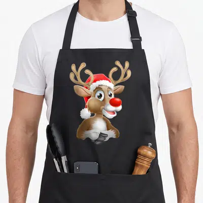 Tablier de cuisine noir avec illustration de Rudolf le renne au nez rouge et bonnet de Père Noël.