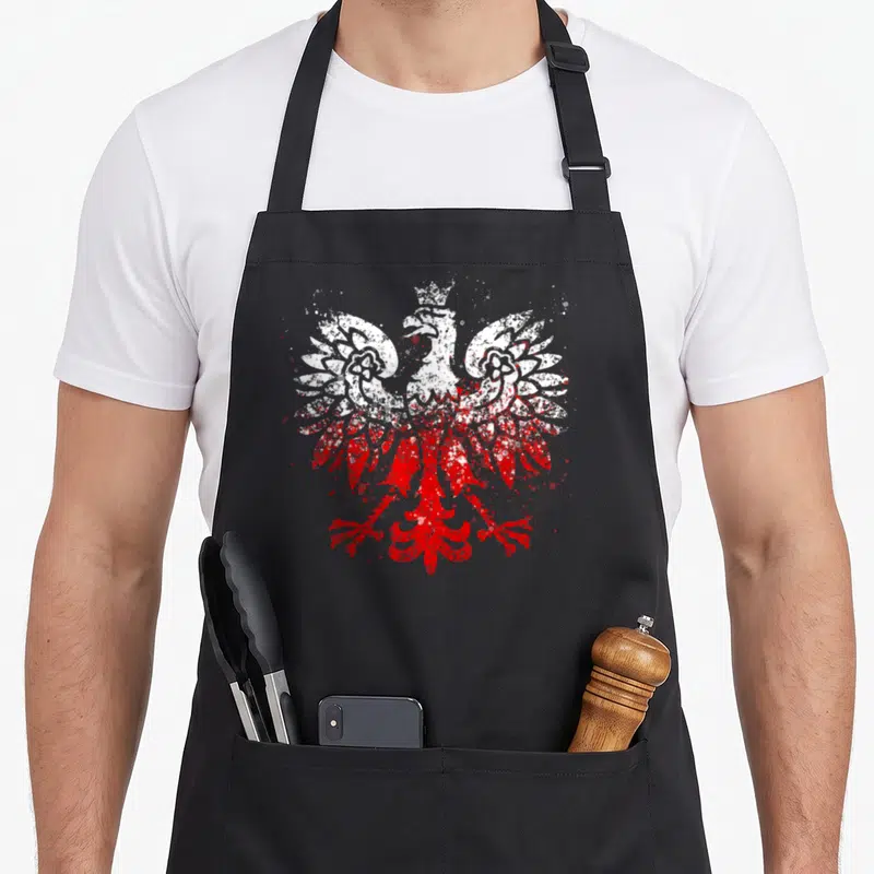 Tablier de cuisine noir avec aigle polonais blanc et rouge au style graffiti distinctif.