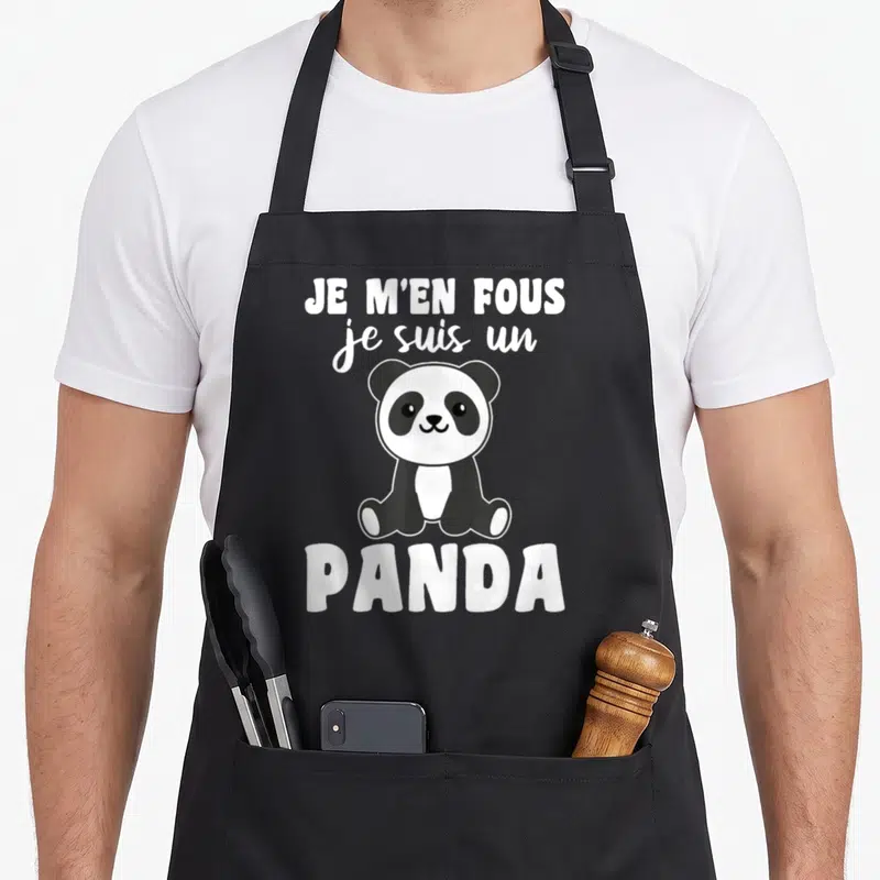 Tablier de cuisine noir avec illustration d'un panda assis et texte blanc Je m'en fous je suis un panda