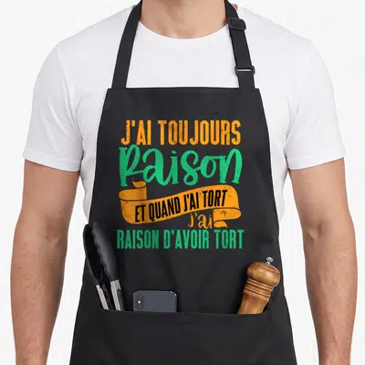 Tablier de cuisine noir avec inscription J'ai toujours raison et quand j'ai tort en orange et vert.