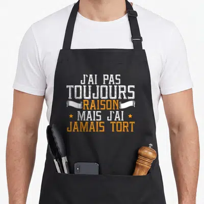 Tablier de cuisine noir avec inscription blanche et orange J'ai pas toujours raison mais j'ai jamais tort