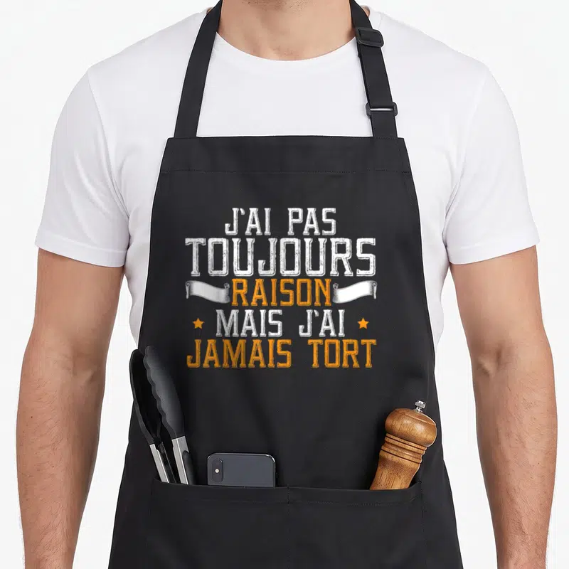 Tablier de cuisine noir avec inscription blanche et orange J'ai pas toujours raison mais j'ai jamais tort