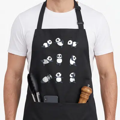 Tablier de cuisine noir orné de neuf illustrations de pandas pratiquant divers exercices de yoga et d'étirement.