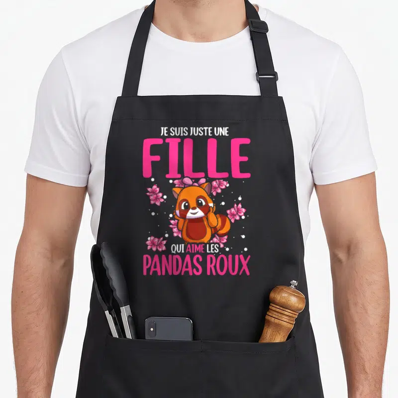 Tablier de cuisine noir avec un panda roux coloré et des fleurs roses autour du texte Je suis juste une fille qui aime les pandas roux.