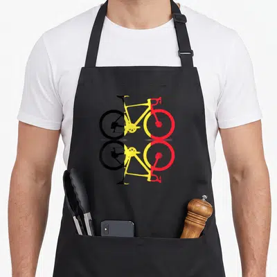Tablier de cuisine noir avec illustration vélo belge noir jaune rouge et reflet symétrique en bas.