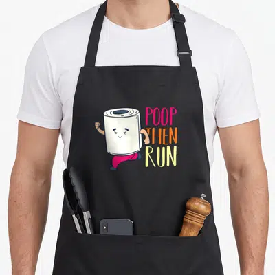 Tablier de cuisine noir avec un rouleau de papier hygiénique courant et le texte Poop then run coloré.