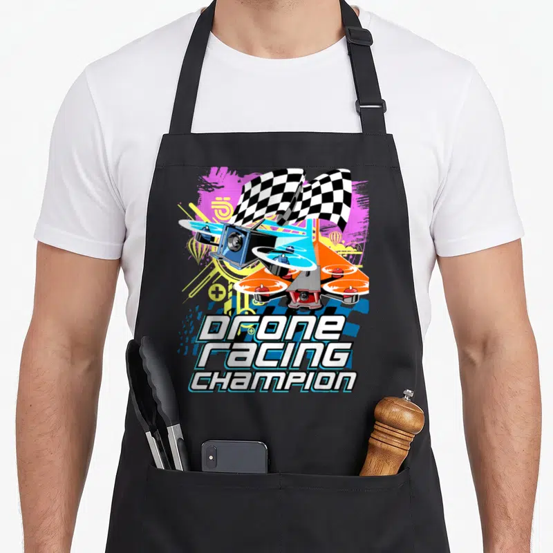 Tablier de cuisine noir avec illustration colorée d'un drone de course et drapeau à carreaux