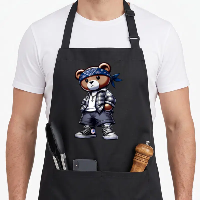 Tablier de cuisine noir avec illustration d'un ours Hip Hop portant un bandana bleu et une chemise à carreaux.